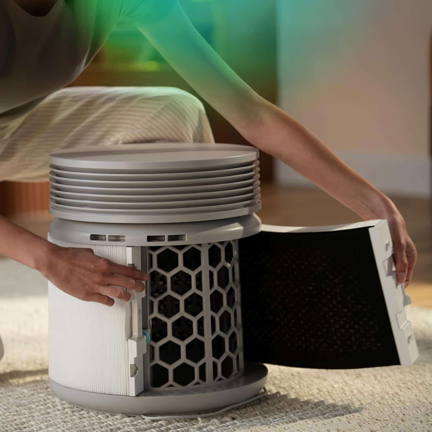 Close-up of a person with smooth, glowing skin using a handheld facial hair removal device, natural lighting showing SilkGlow in use